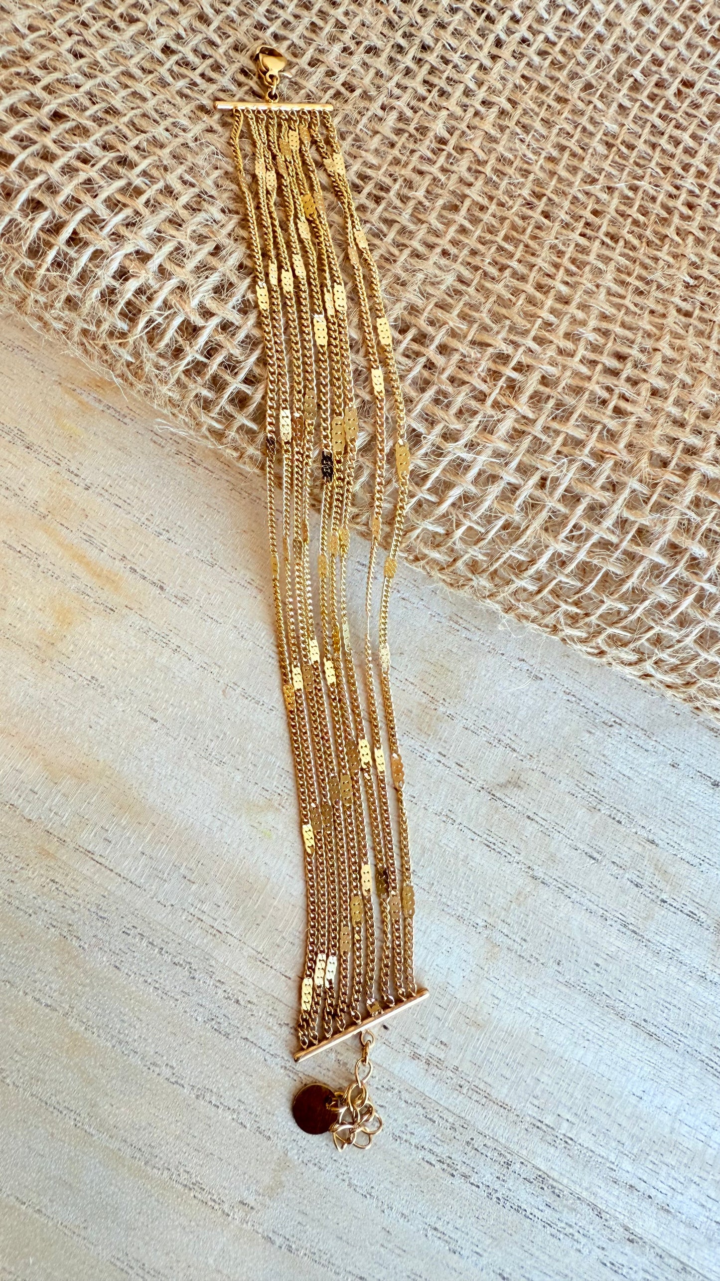 Bracelet multi-chaînes dorées style manchette souple