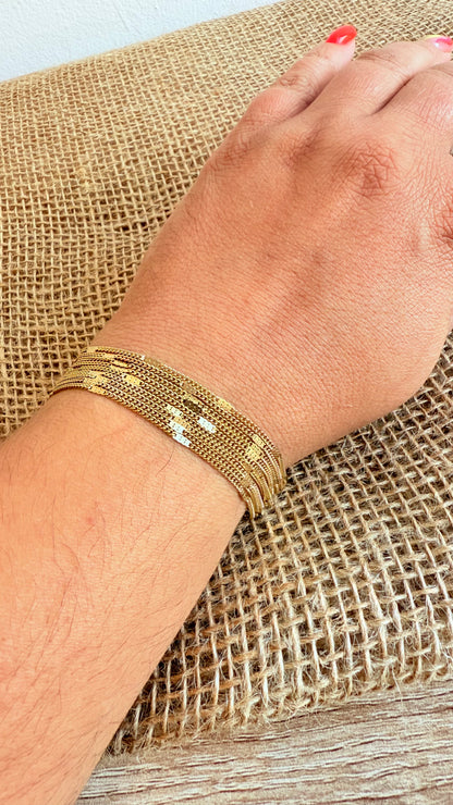 Bracelet multi-chaînes dorées style manchette souple