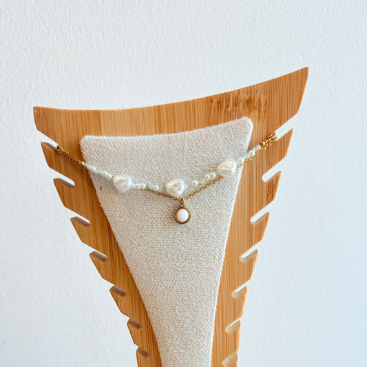 Chaîne de cheville dorée perles blanches