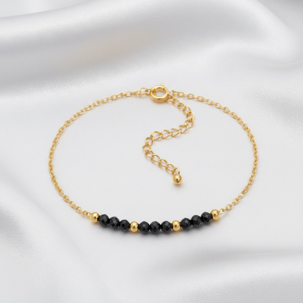 Bracelet Spinelle noire – Perles facettées & doré