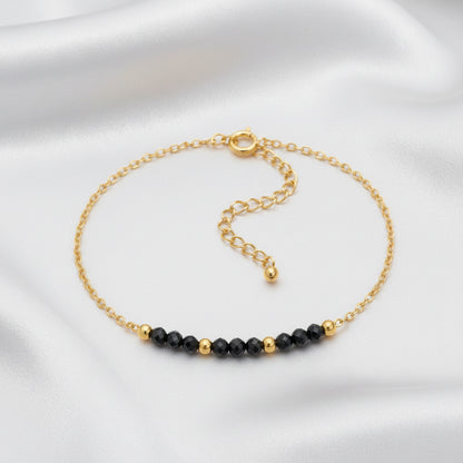 Bracelet Spinelle noire – Perles facettées & doré