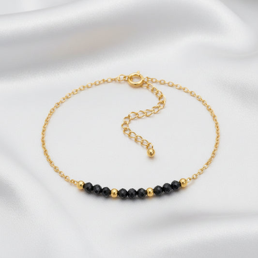 Bracelet Spinelle noire – Perles facettées & doré