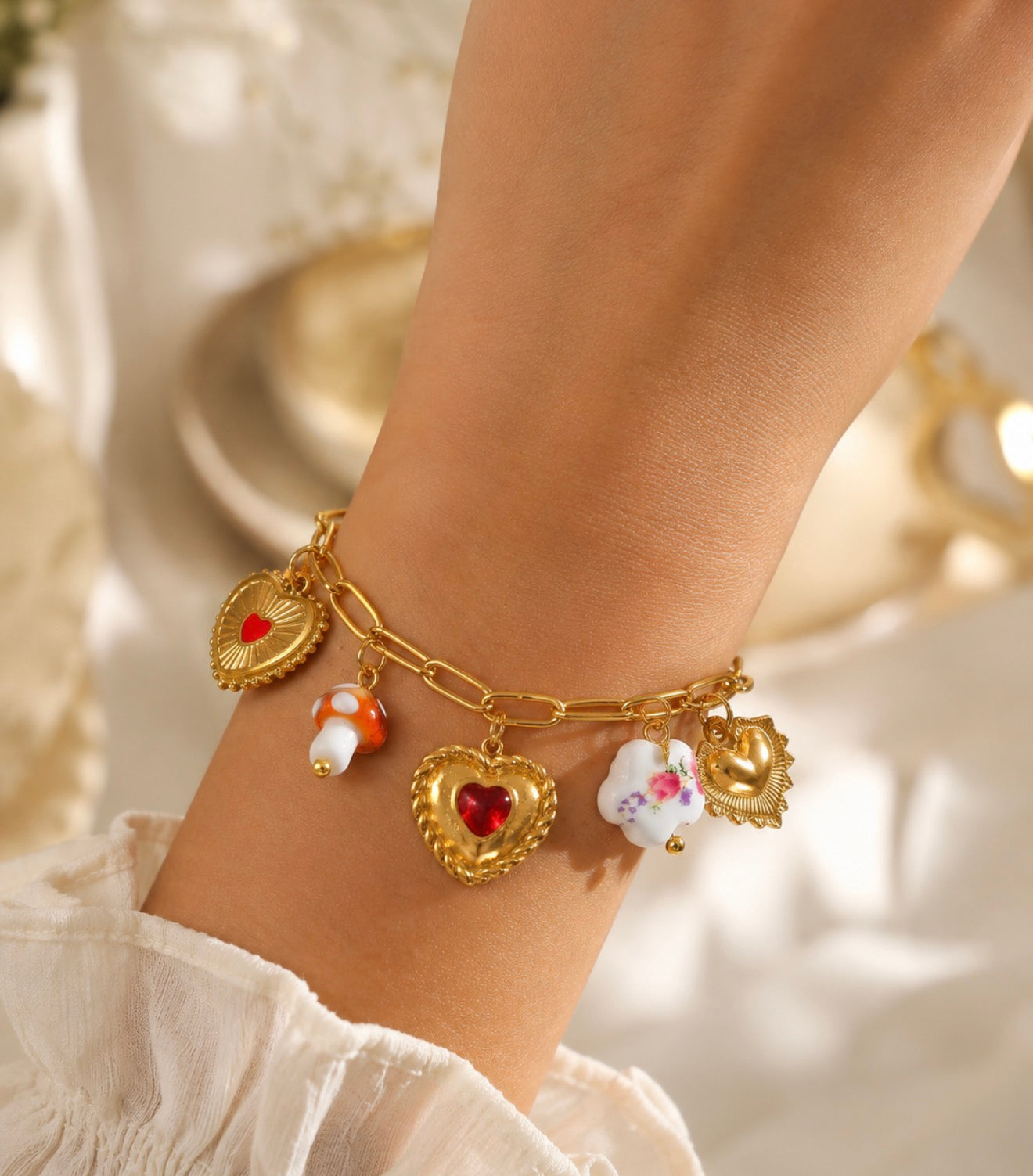 Bracelet à charms cœurs & fleurs