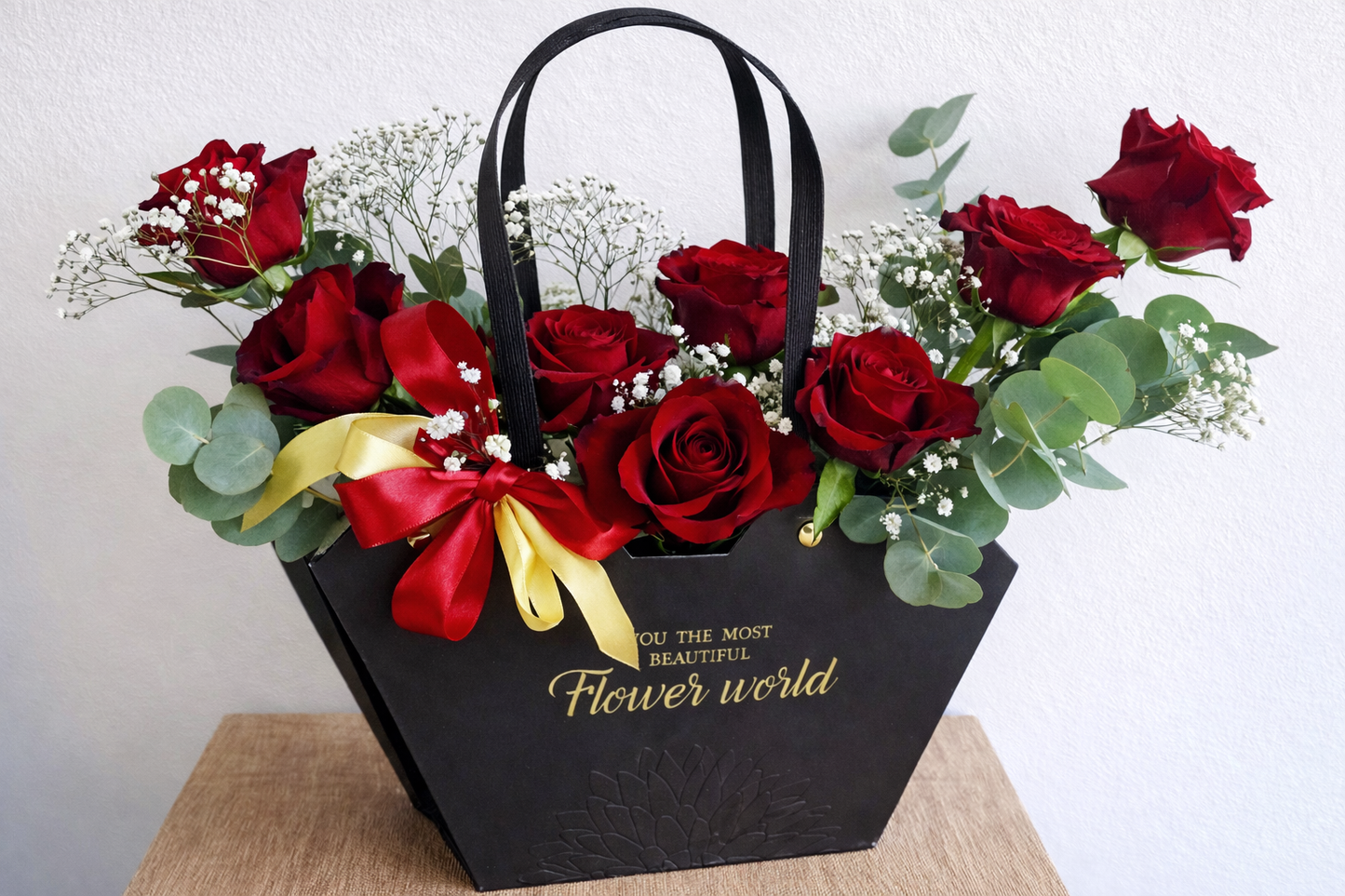Composition florale en sac Roses rouges