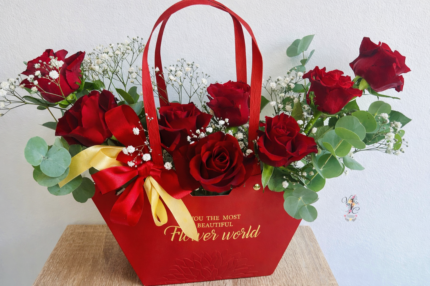 Composition florale en sac Roses rouges