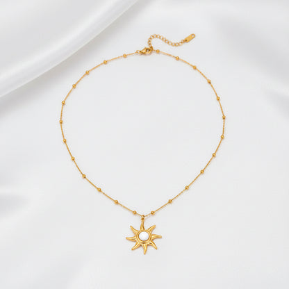 Collier soleil nacré doré