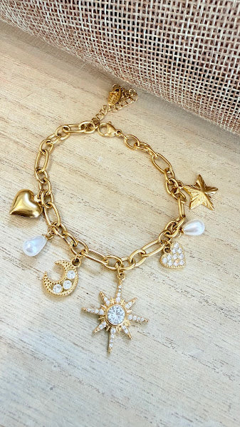 Bracelet breloque astres et cœurs